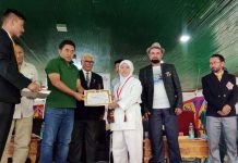 A participant being awarded with certificate at Kargil by dignitaries. -Excelsior/Basharat Ladakhi
