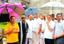 MP, Jugal Kishore Sharma and former Deputy CM, Kavinder Gupta along with other BJP leaders during tour to rain hit areas in Gandhi Nagar on Thursday.