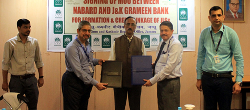 Exchanging of MoUs between NABARD and JKGB.