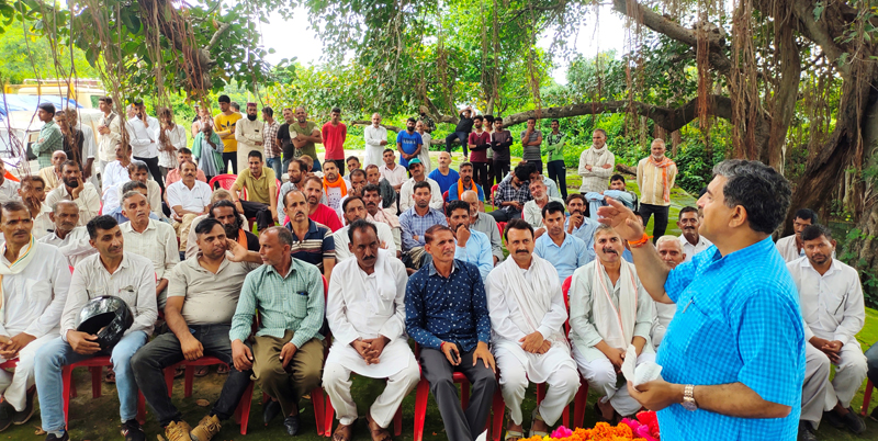 MP Jugal Kishore Sharma addressing a public meeting in Mathwar, Nagrota on Saturday.