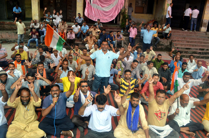PHE daily wagers staging protest dharna in Chief Engg's office at BC Road in Jammu on Friday. -Excelsior/Rakesh