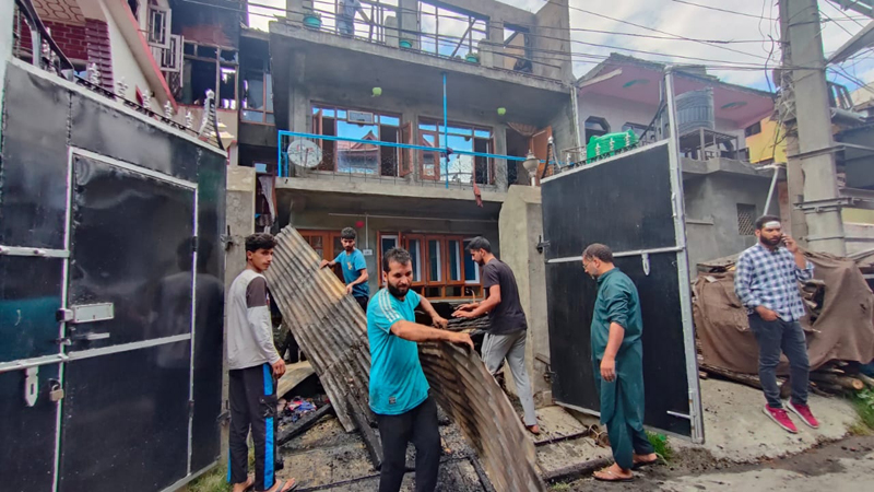 Residential houses damaged due to fire. - Excelsior/Shakeel Residential houses damaged due to fire. - Excelsior/Shakeel