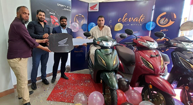 Dignitaries launching Honda Activa Premium at Arise Honda Hyderpora in Srinagar.