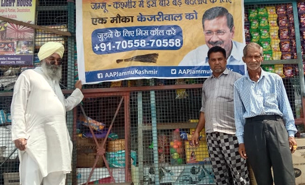 AAP volunteers during door-to-door campaign at Jammu on Saturday. AAP volunteers during door-to-door campaign at Jammu on Saturday.