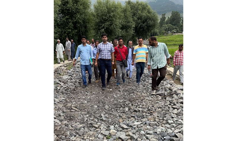 Executive Engineer PWD Abhishek Gupta along with others during inspection of construction work.