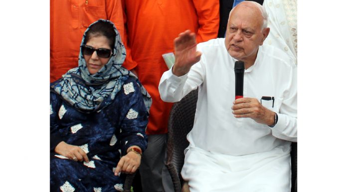 NC president Dr Farooq Abdullah and PDP chief Mehbooba Mufti at an All-Party Meeting in Jammu on Saturday.