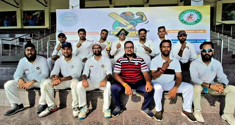 Players posing for a group photograph at MA Stadium Jammu on Sunday. Players posing for a group photograph at MA Stadium Jammu on Sunday.