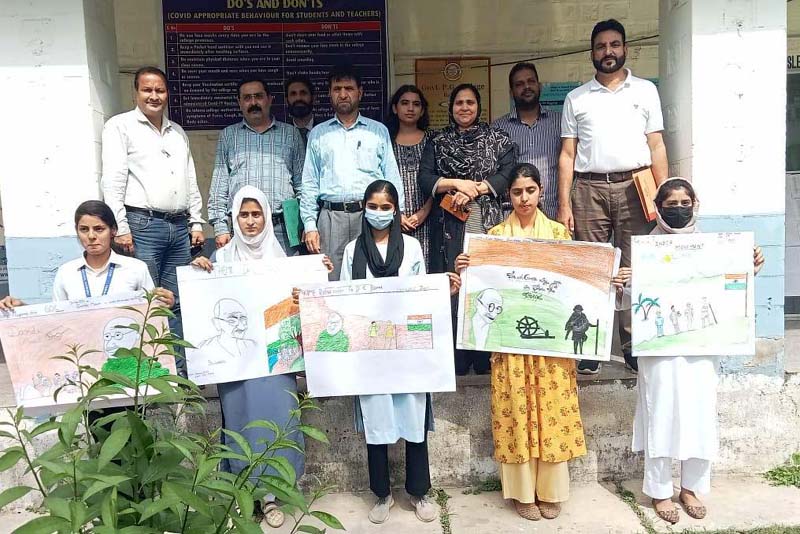 Winners displaying certificates while posing for a photograph with school staff. Winners displaying certificates while posing for a photograph with school staff.