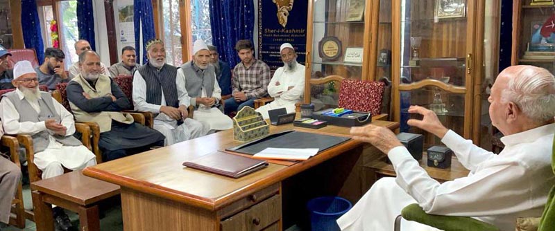 NC president, Dr Farooq Abdullah listening to a delegation at his residence in Srinagar on Tuesday.