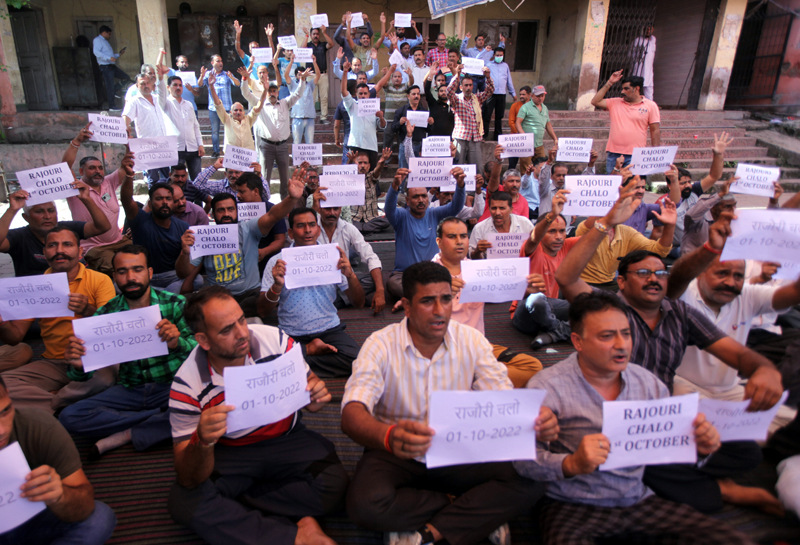 PHE workers staging protest dharna outside Chief Engg's office at B C Road in Jammu on Tuesday. Excelsior/ Rakesh
