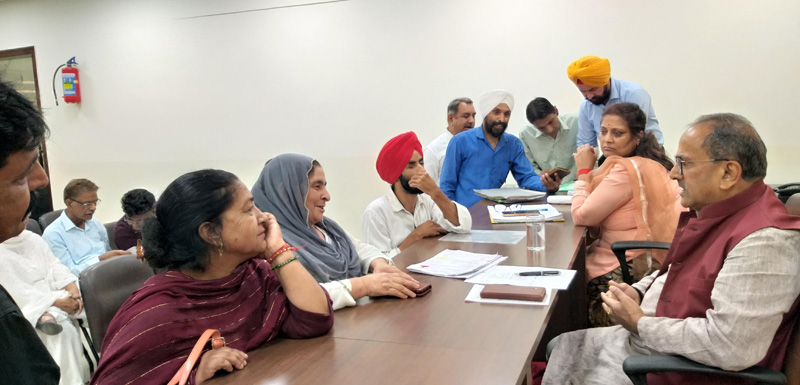BJP senior leader and former Deputy CM, Dr Nirmal Singh hearing public grievances at party office Jammu on Monday . BJP senior leader and former Deputy CM, Dr Nirmal Singh hearing public grievances at party office Jammu on Monday .