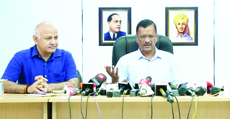 keji Delhi Chief Minister Arvind Kejriwal with Deputy Chief Minister Manish Sisodia addressing a press conference, in New Delhi on Wednesday. (UNI)