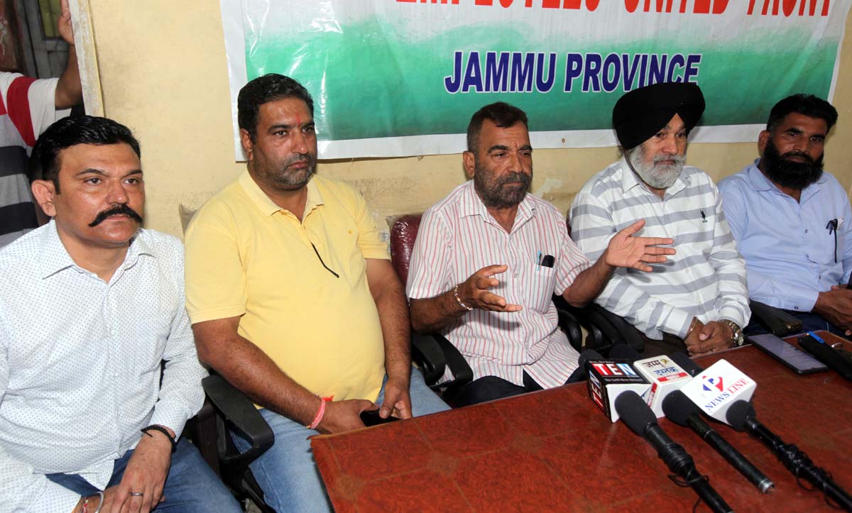 Senior members of PHE Employees United Front addressing joint press conference in Jammu on Saturday. -Excelsior/Rakesh