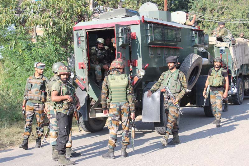 Troops at the site of encounter at Anantnag on Tuesday. -Excelsior/Sajad Dar Troops at the site of encounter at Anantnag on Tuesday. -Excelsior/Sajad Dar