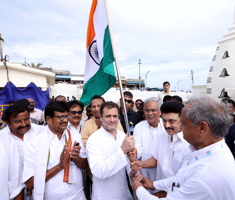 Tamil Nadu Chief Minister M K Stalin presenting the national flag to Congress leader Rahul Gandhi during ‘Bharat Jodo Yatra’ in Kanyakumari on Wednesday. (UNI)