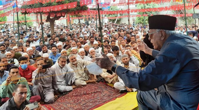 NC president Dr Farooq Abdullah addressing party workers in South Kashmir on Monday.