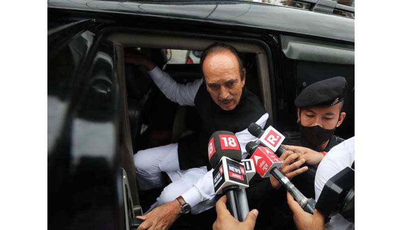 Former J&K Chief Minister Ghulam Nabi Azad talking to media persons after arriving from New Delhi at Jammu on Sunday. -Excelsior/Rakesh