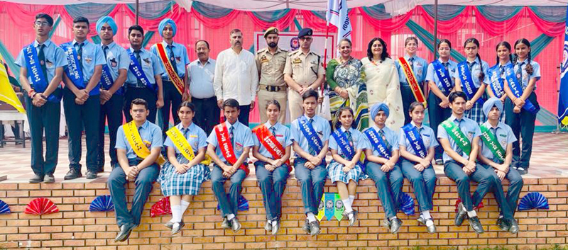 Newly elected body of Doon International School posing for a group photograph along with dignitaries on Friday.