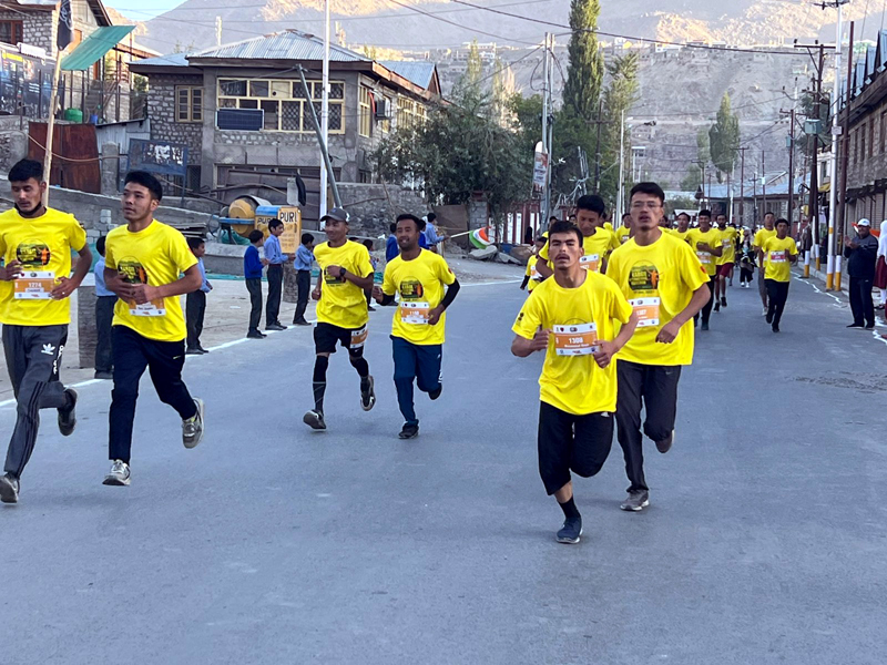 Participants during the Kargil International Marathon on Monday. -Excelsior/Basharat Ladakhi