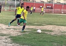 Players in action during a football match at GGM Science College Ground Jammu on Friday.