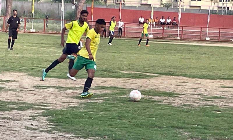 Players in action during a football match at GGM Science College Ground Jammu on Friday. Players in action during a football match at GGM Science College Ground Jammu on Friday.