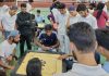 Players evincing keen interest in a Carrom game at Pulwama on Tuesday.