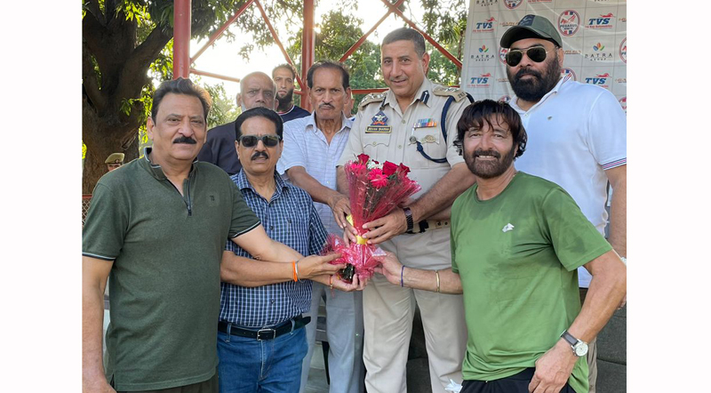 A dignitary being awarded with bouquet at Jammu on Wednesday.