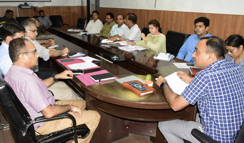 Divisional Commissioner chairing a meeting. Divisional Commissioner chairing a meeting.