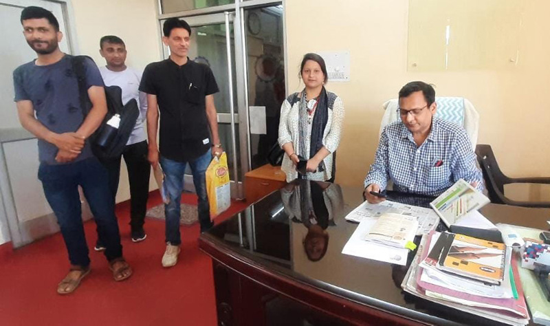 PF Commissioner Rizwan Uddin listening to grievances in his office. PF Commissioner Rizwan Uddin listening to grievances in his office.