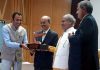 Secretary AHD Ladakh Ravinder Kumar receiving an award during Outlook Agritech Summit & Awards 2022.