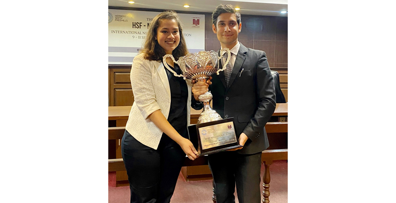 Wamic Wasim Nargal and Chhavi Singla posing with award. Wamic Wasim Nargal and Chhavi Singla posing with award.