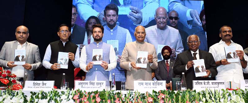 Former President of India, Ram Nath Kovind releasing the book titled 'Ambedkar and Modi; Reformer's Ideas Performer's Implementation's, in New Delhi on Friday.