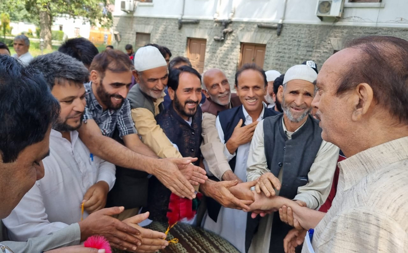 Former J&K CM, Ghulam Nabi Azad interacting with people in Kashmir on Monday.