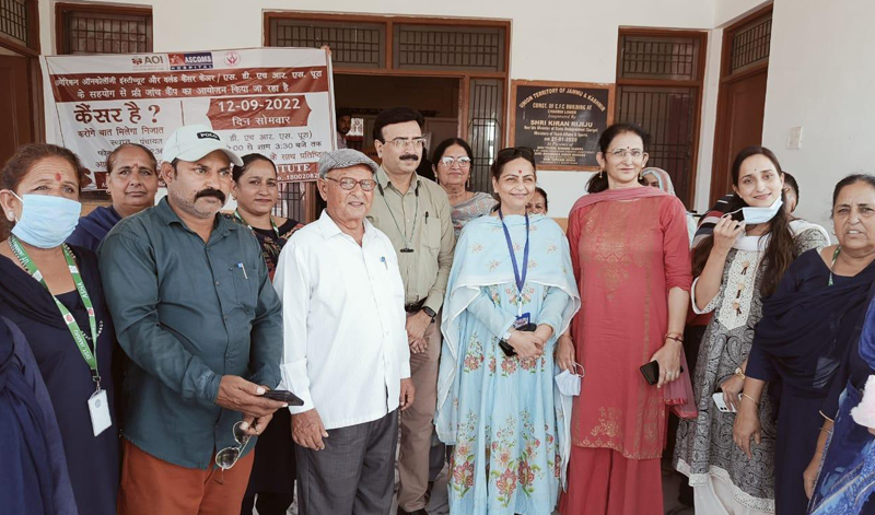 AOI and World Cancer Care teams posing together during a cancer screening camp in RS Pura area of Jammu.