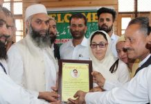 Waqf Board Chairperson, Dr Darakhshan Andrabi being felicitated by Moulvis and others at Sufi Shrine in Baramulla on Saturday.