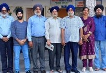 Punjabi writers and poets posing together after a literary meeting in Jammu.