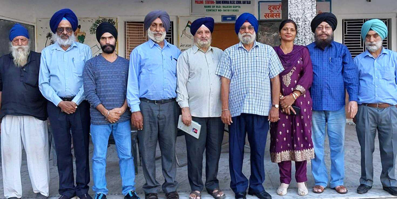 Punjabi writers and poets posing together after a literary meeting in Jammu.