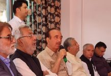 Former J&K CM, G N Azad speaking at a meeting in Srinagar on Thursday.