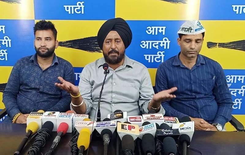 AAP spokesperson T S Tony addressing a press conference at Jammu on Saturday. AAP spokesperson T S Tony addressing a press conference at Jammu on Saturday.
