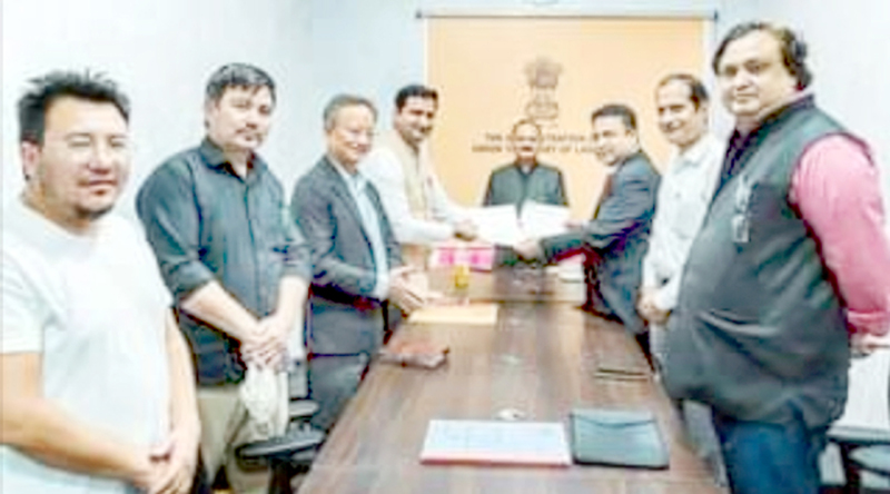 Senior officers of H&ME Department Ladakh and EESL during signing of a MoU at Leh. Senior officers of H&ME Department Ladakh and EESL during signing of a MoU at Leh.