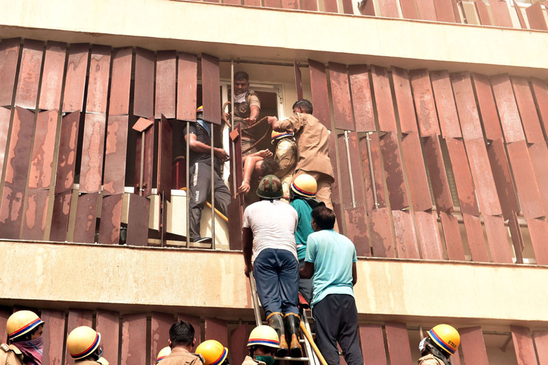 Fire Brigade personnel trying to douse a major fire broke out at Levana Hotel,in Lucknow on Monday. (UNI) Fire Brigade personnel trying to douse a major fire broke out at Levana Hotel,in Lucknow on Monday. (UNI)