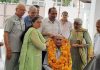 People garlanding chairman of TR Gupta Charitable Trust on opening of a free medical clinic at Trust Bhawan, Jammu.