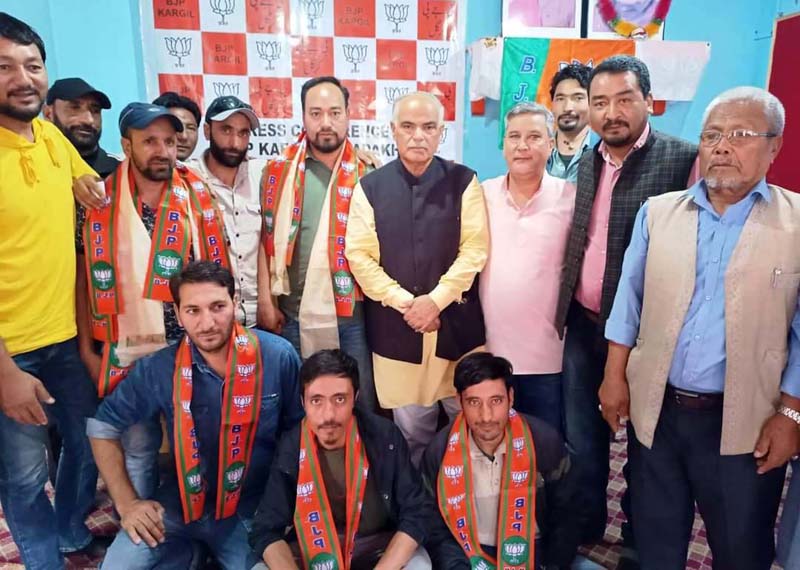 BJP general secretary (Org), Ashok Koul posing with party men at Kargil on Friday.