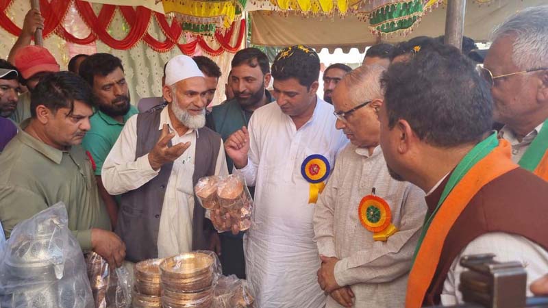 BJP general secretary (Org), Ashok Koul inaugurating vocal for local and cultural programme at Baramulla on Tuesday. BJP general secretary (Org), Ashok Koul inaugurating vocal for local and cultural programme at Baramulla on Tuesday.