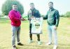Officials of Downtown Heroes Football club honouring ex International Footballer Arun Malhotra.