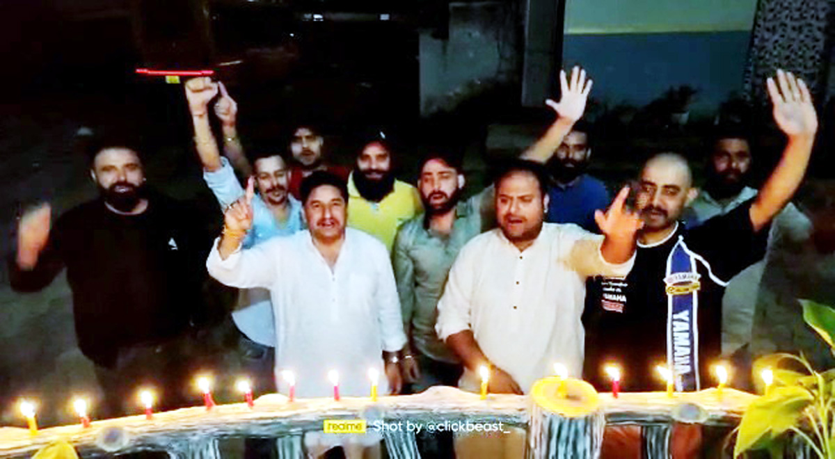 Jubilant Pahari people lit candles at Thannamandi town of Rajouri on HM’s announcement to grant ST status to them on Tuesday. - Excelsior/Imran