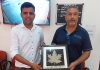 International footballer and AIFF member, Arun Malhotra being honoured by Dr Daud Iqbal Baba at Jammu University on Thursday.