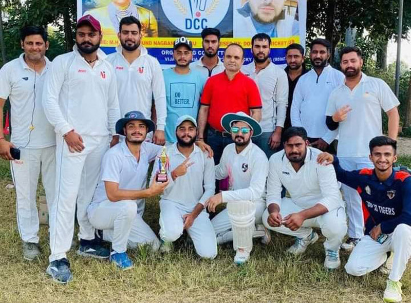 Team displaying trophy while posing for a group photograph at Nagbani Jammu. Team displaying trophy while posing for a group photograph at Nagbani Jammu.