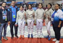 Fencing team posing for a group photograph in Gujarat on Friday.