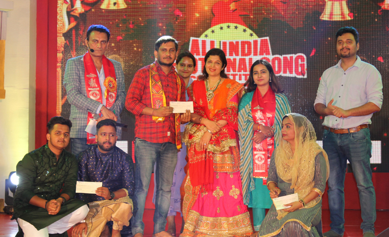 A winner being awarded by the dignitaries at Katra on Friday.
